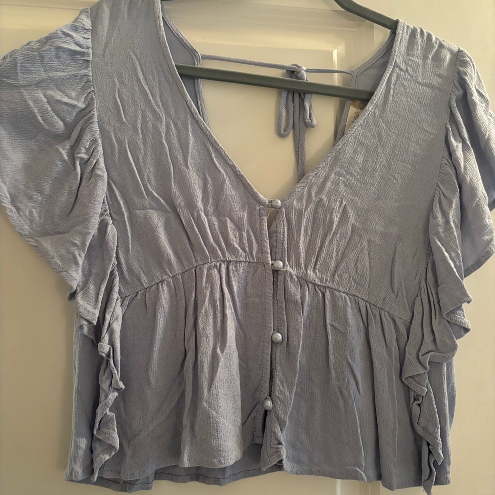 Light blue flowy top with v back